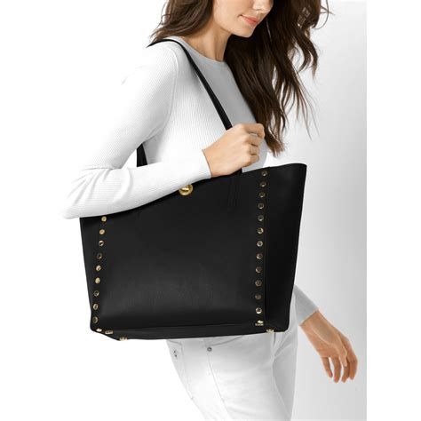 fake michael michael kors rivington stud large tote|michael kors bag found.